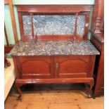 An Edwardian mahogany washstand of small proportions,