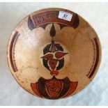 A Samarkand-type conical pottery bowl, decorated with stylized zoomorphic motif and a text panel.