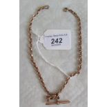 A 9ct rose gold rope and link Albert chain and T-bar. Condition Report: 21 grams.