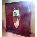 An Edwardian mahogany, florally inlaid and boxwood strung triple wardrobe,