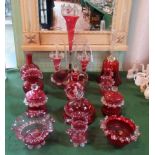 A collection of Victorian and later cranberry glassware,