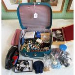 A large quantity of costume jewellery in a blue leather vanity box,
