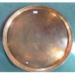 A large circular engraved Egyptian tray.