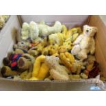A collection of jointed plush and mohair collector's teddy bears.