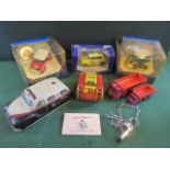 A collection of vintage, die-cast and tin plate vehicles,