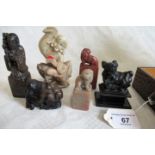A collection of Chinese carved soapstone seals.