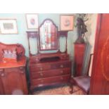 An Edwardian mahogany dressing mirror,