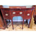 A George III mahogany, crossbanded and strung sideboard of small proportions,