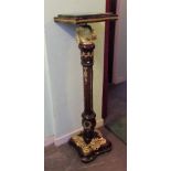 An early 19th century-style mahogany and giltwood mounted torchere,
