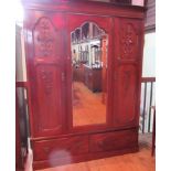 An Edwardian mahogany triple wardrobe,