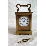 A French eight day chiming carriage clock. Condition Report: 18cms handle up.