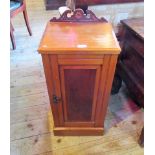 An Edwardian satin wood pot cupboard.