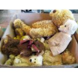 A collection of large jointed mohair and plush collector's teddy bears.