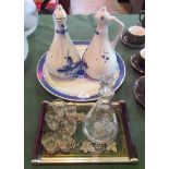 A pair of 20th century Delft gin ewers and stoppers,