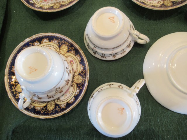 A Victorian English bone china part-tea service, decorated with blue borders and cut flowers. - Image 3 of 3