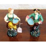 A pair of late 19th century Minton figural salts,