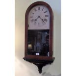 An Edwardian mahogany cased wall clock,
