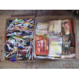 A collection of many dozens of office use ball point pens and others,