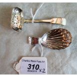 A William IV silver shell form caddy spoon and a George IV silver rectangular bowl sifting spoon by