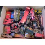 A collection of in excess of two dozen Dinky and other die-cast model vehicles,
