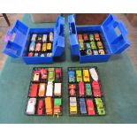 Two Matchbox Motorcity carrying cases, each with contents of die-cast and other model vehicles.