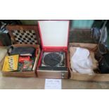 A circa 1960's Ultra record player, together with a lace christening gown and other similar items,
