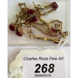 A ruby and diamond necklace and earrings en-suite,