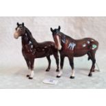 Two Beswick horses, each brown gloss glazed, one with head turned to left.