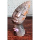 A carved veined green marble stylized African-esque bust study of a lady,