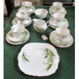 A Melba bone china part-tea service, comprising: six cups, saucers, tea plates, cake plate,