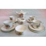 A circa 1930's nursery/doll's part-tea set, comprising: teapot, four cups, four saucers, tea plates,