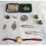 A collection of miscellaneous items, to include: engraved silver Victorian vesta case, silver fob,