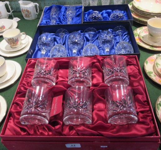 A cased set of six cut glass tumblers,