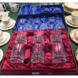 A cased set of six cut glass tumblers,