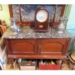 An Edwardian mahogany washstand of small proportions,