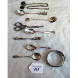 A quantity of miscellaneous silverwares, to include: silver handled nail scissors, apostle spoons,