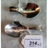Two George III silver caddy spoons of simple pressed spade form,