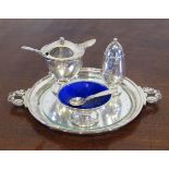 A Georg Jensen design Danish silver four piece Athenian decorated table cruet set to include: