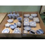 Two boxes containing a collection of approximately two dozen pieces of light blue Wedgwood blue