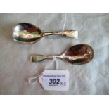 Two George IV silver fiddle pattern caddy spoons, with ovoid bowl and floral engraved decoration,