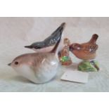 A Beswick nuthatch, a grouse and a Russian porcelain wren.