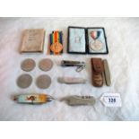 A collection of items, to include: a Great Wall Victory medal to F Groom of the Royal Navy,