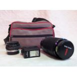 A Vivitar Zoom series I 70-210mm lens,