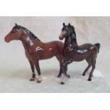 A Beswick New Forest pony, together with a Beswick model of a trotting mare, each gloss glazed.