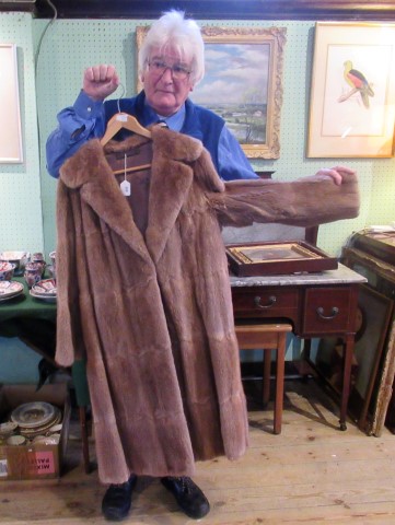 A three-quarter length lady's mink coat.