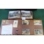 Two tapa cloth covered photograph albums,