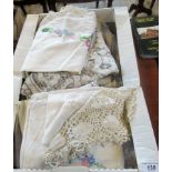 A box of lace edged, crochet and hand embroidered linen and lace.