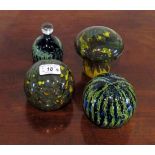 Four Mdina paperweights, one of mushroom form,
