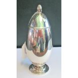 A Georg Jensen design Danish silver oviform sugar caster, with a stylized stepped base,