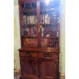 A George III-style mahogany bookcase cabinet,